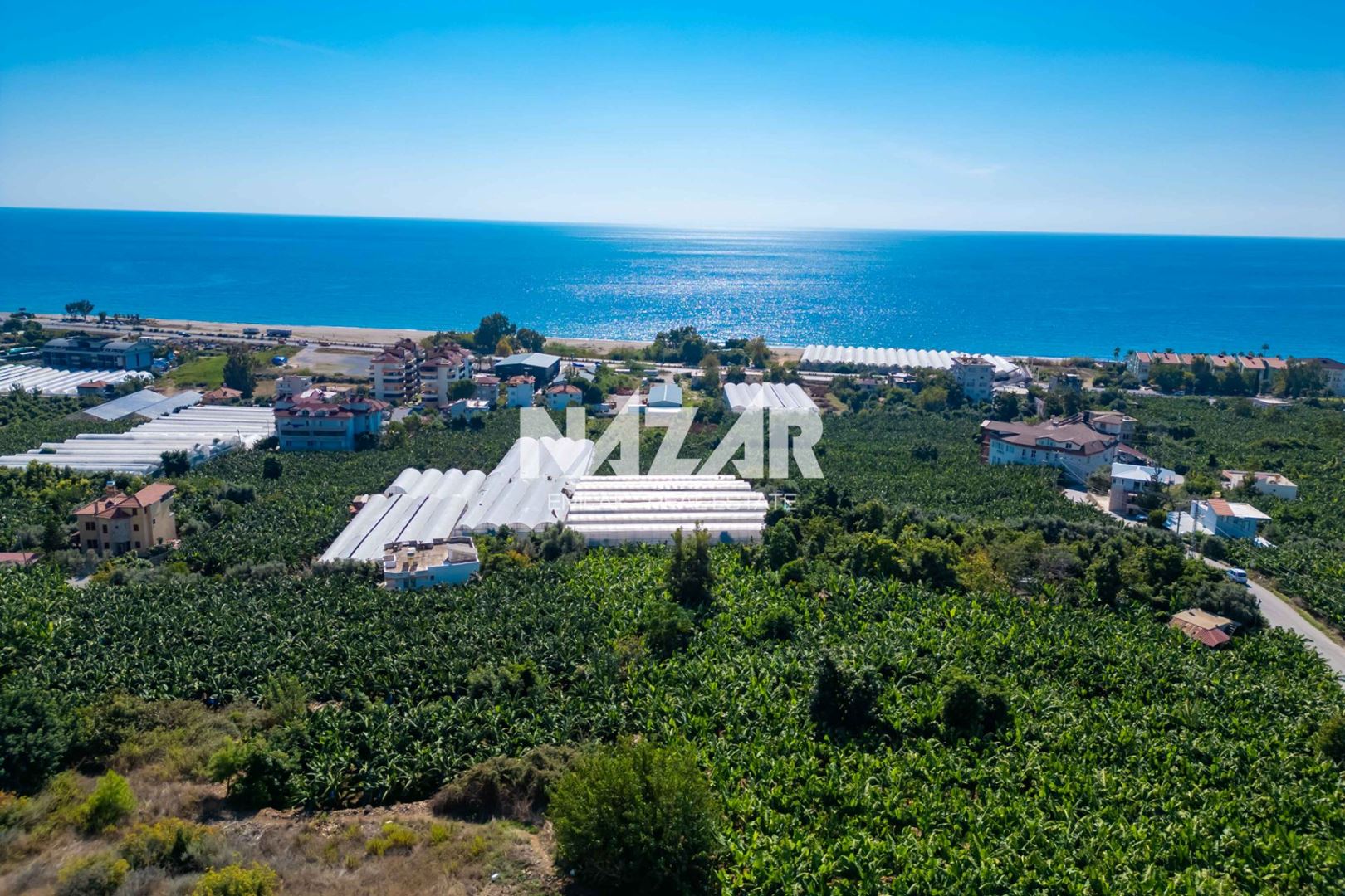 Alanya İshaklı’da 1.665 m2 Deniz Manzaralı Tarla · 1