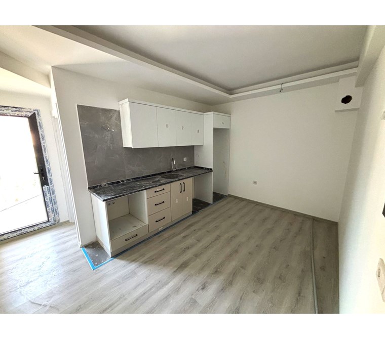 Kuşadası Davutlarda Sıfır 1+1 Satılık Daire Denize Yakın Ara kat