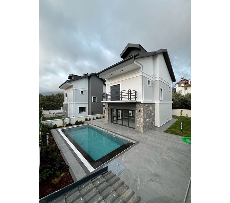  Fethiye Ölüdeniz Hisarönü’nde Modern Mimariyle Hayallerinize Dokunan 4+1 Sıfır Özel Havuzlu Villa