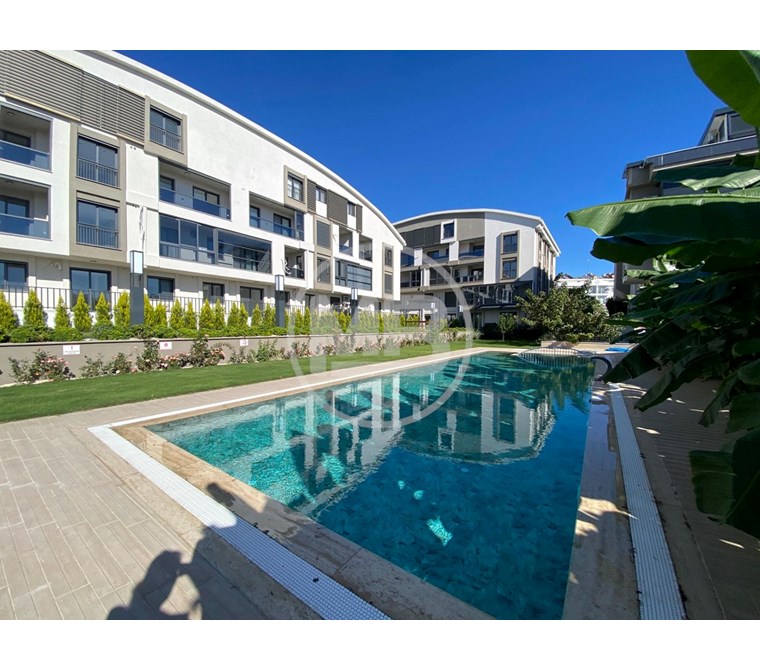 DİDİM DE HAVUZLU LÜKS SİTE İÇİNDE 2+1 BAHÇE KULLANIMLI DAİRE