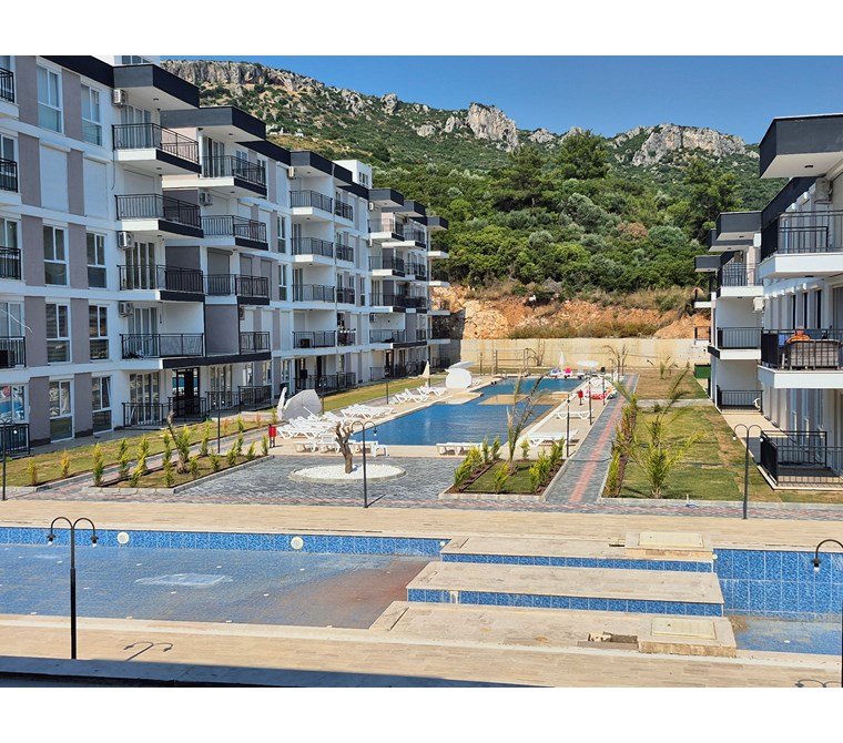 Kuşadası Eşin Vadi'de Satılık 2+1 Sıfır Daire (Eşyalı Seçenekli)