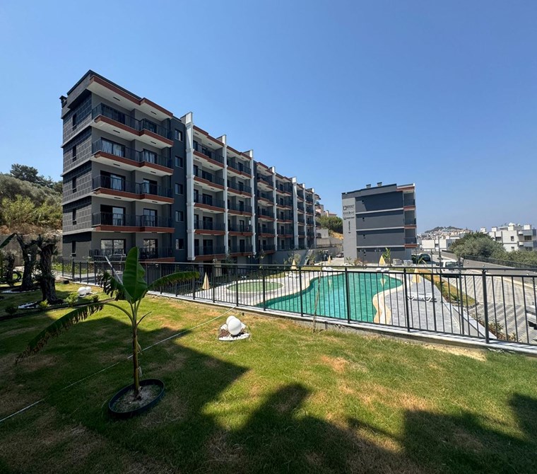 KUŞADASI EGE MAHALLESİNDE ÖZEL BİR PROJEDE 1+1 SATILIK BAHÇELİ