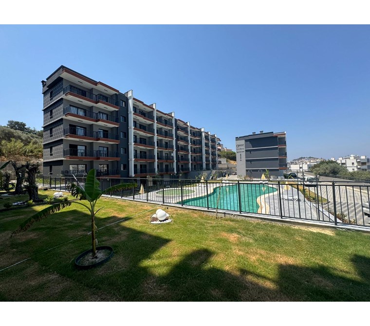 KUŞADASI EGE MAHALLESİNDE ÖZEL BİR PROJEDE 1+1 SATILIK BAHÇELİ