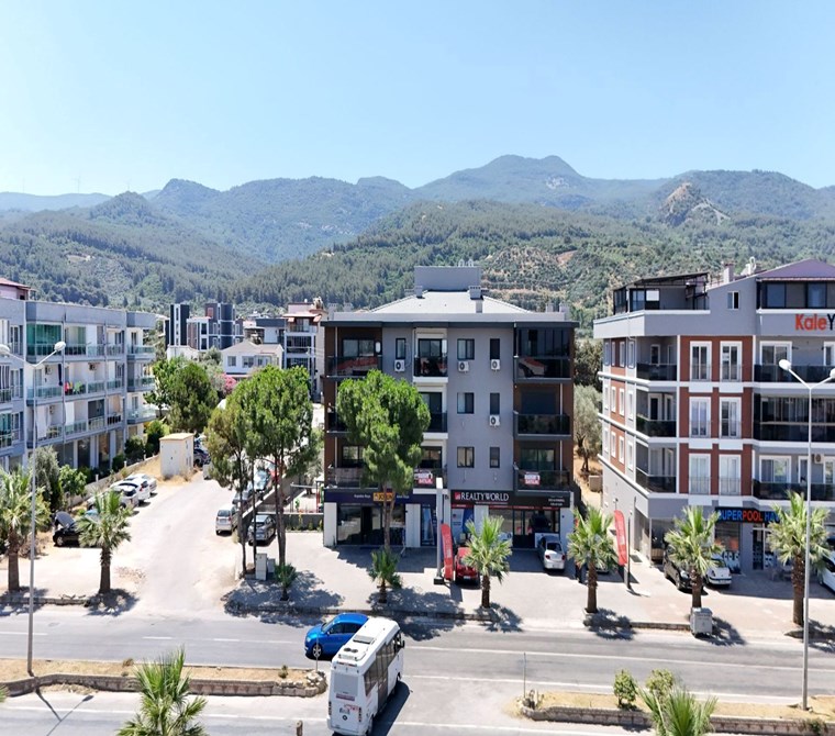 KUŞADASI DAVUTLAR'DA İLKİM İNVEST CADDE KONUTLARINDA SATILIK 2+1 SIFIR DAİRE