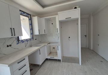 ALTIN EMLAK ORTACA KARABURUN MAHALLESİNDE SATILIK 2+1 ZEMİN