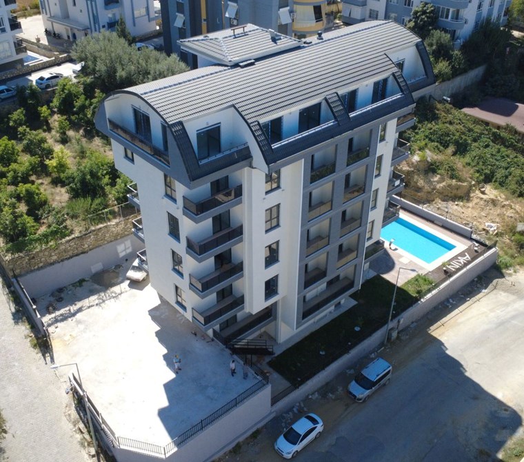 Avsallar'da Satılık 1+1 Daire, Zemin Kat, 52m², Havuzlu