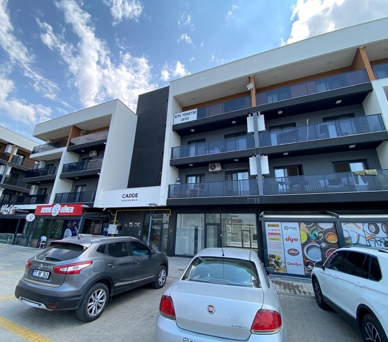 Cadde sitesi 17.000 TL kiracılı Satılık 1+1 daire /KREDİYE UYGUN