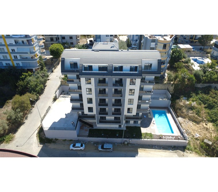Avsallar’da Yeni Binada Havuzlu Site İçinde Özel Tasarımlı 1+1