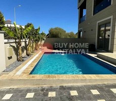 Antalya Belek'te Lüks İkiz Villalar: Havuz, Bahçe ve Güvenlik Kameraları