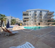 DİDİM DENİZE YAKIN SİTE İÇİNDE GENİŞ BALKONLU EŞYALI 2+1 DAİRE