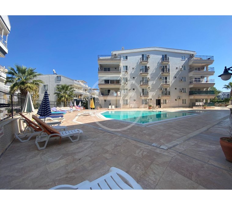 DİDİM DENİZE YAKIN SİTE İÇİNDE GENİŞ BALKONLU EŞYALI 2+1 DAİRE