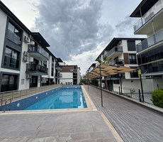 REALTY WORLD EFES'TEN HAVUZLU SİTE İÇERİSİNDE 3+1 BAHÇE KATI