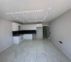 REALTY WORLD EFES'TEN DAVUTLAR MERKEZDE LÜKS 2+1 SIFIR DAİRE