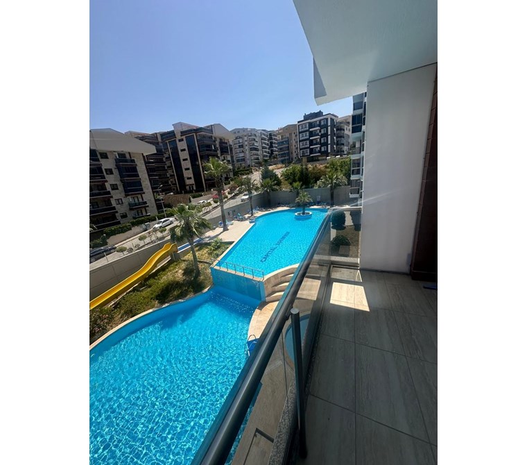 Kuşadası İkiçeşmelik Şehzade konaklarında Deniz manzaralı Eşyalı Kiralık Daire