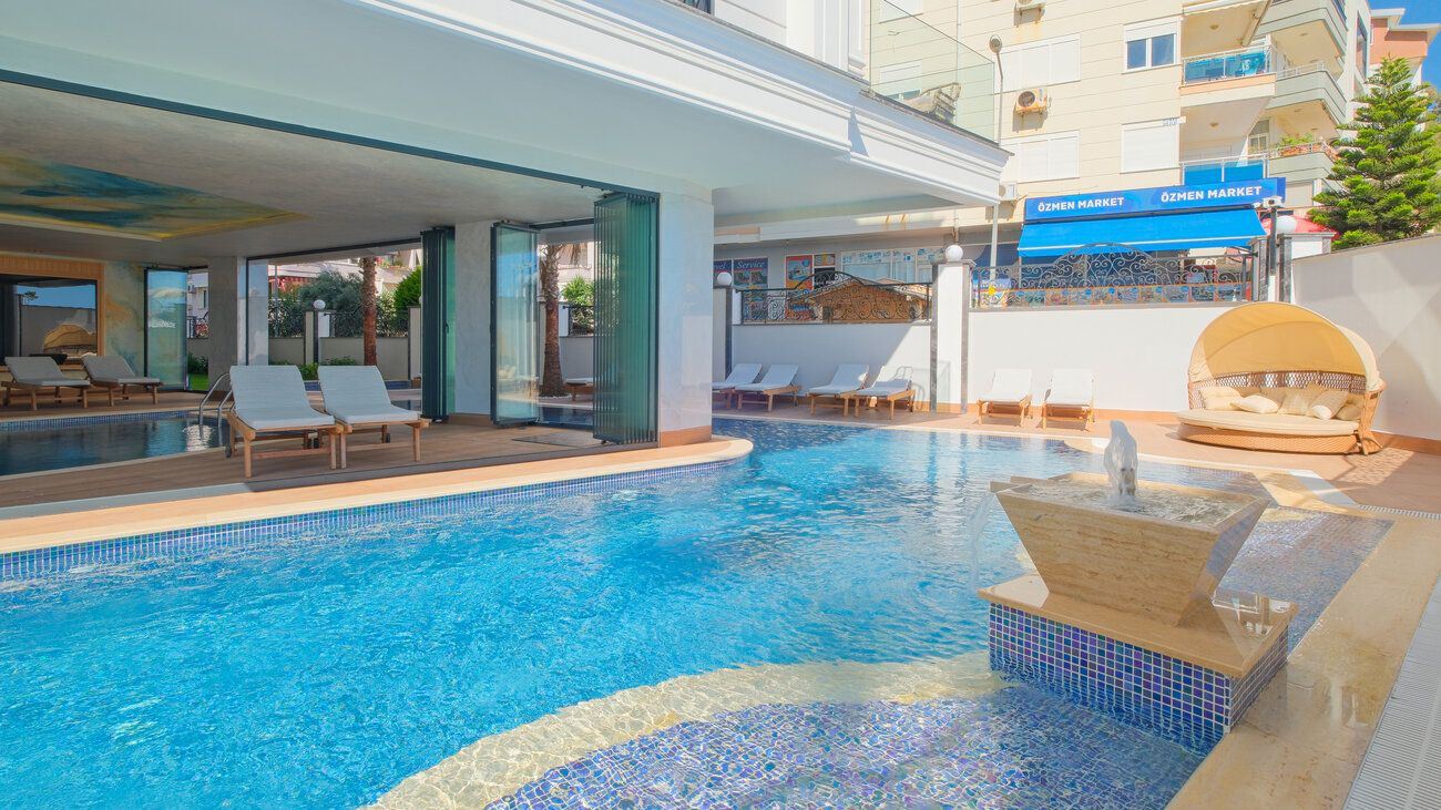 FULLY FURNISHED 3+1 SEAFRONT APARTMENT FOR SALE WITH SEA VIEW IN ALANYA CENTER