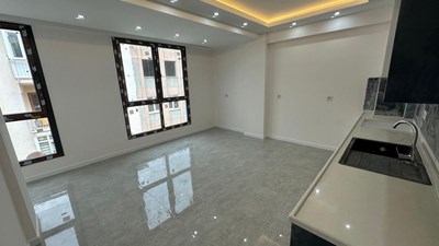 ÇINAR'DA PTT'NİN ARKASINDA 2+1 80m2 SIFIR DAİRELER