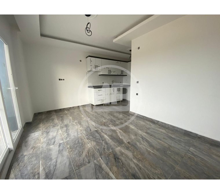 Aydın/Didim de satılık havuzlu-asansörlü 1+1 daire