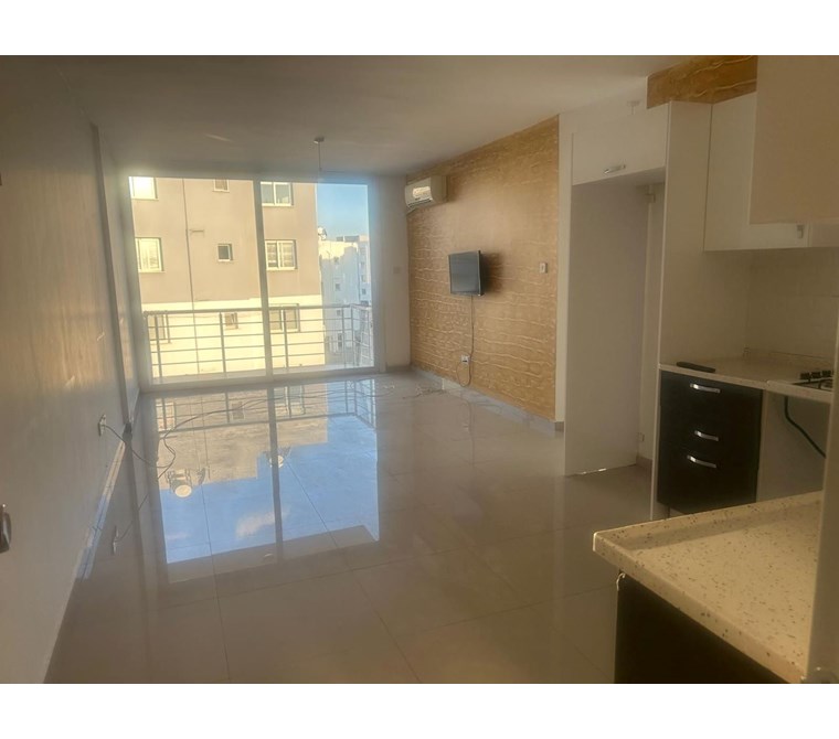 GÖNYELİ BÜYÜKKİLER SÜPERMARKET ARKASINDA 3.KAT ASANSÖRÜ EŞYASIZ 2+1 DAİRE AYLIK 500 STG DEN