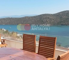 Bodrum'da Deniz Manzaralı ve Havuzlu Site İçerisinde Müstakil Bahçeli 4 Odalı Satılık Villa
