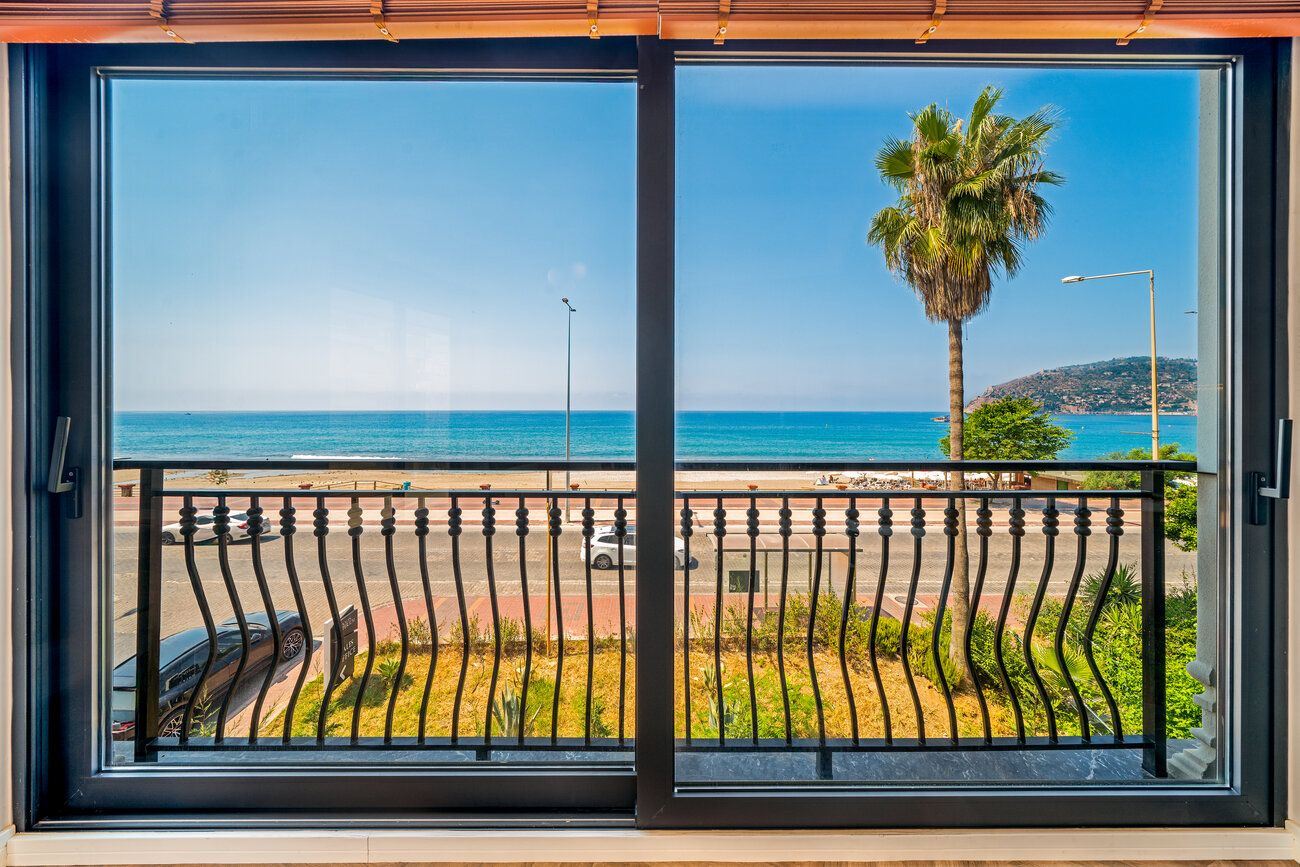 FULLY FURNISHED 3+1 SEAFRONT APARTMENT FOR SALE WITH SEA VIEW IN ALANYA CENTER · 2 · Photos
