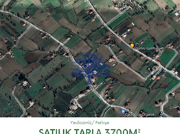 Fethiye Yeşilüzümlü satılık tarla 3700m² merkeze 1200m
