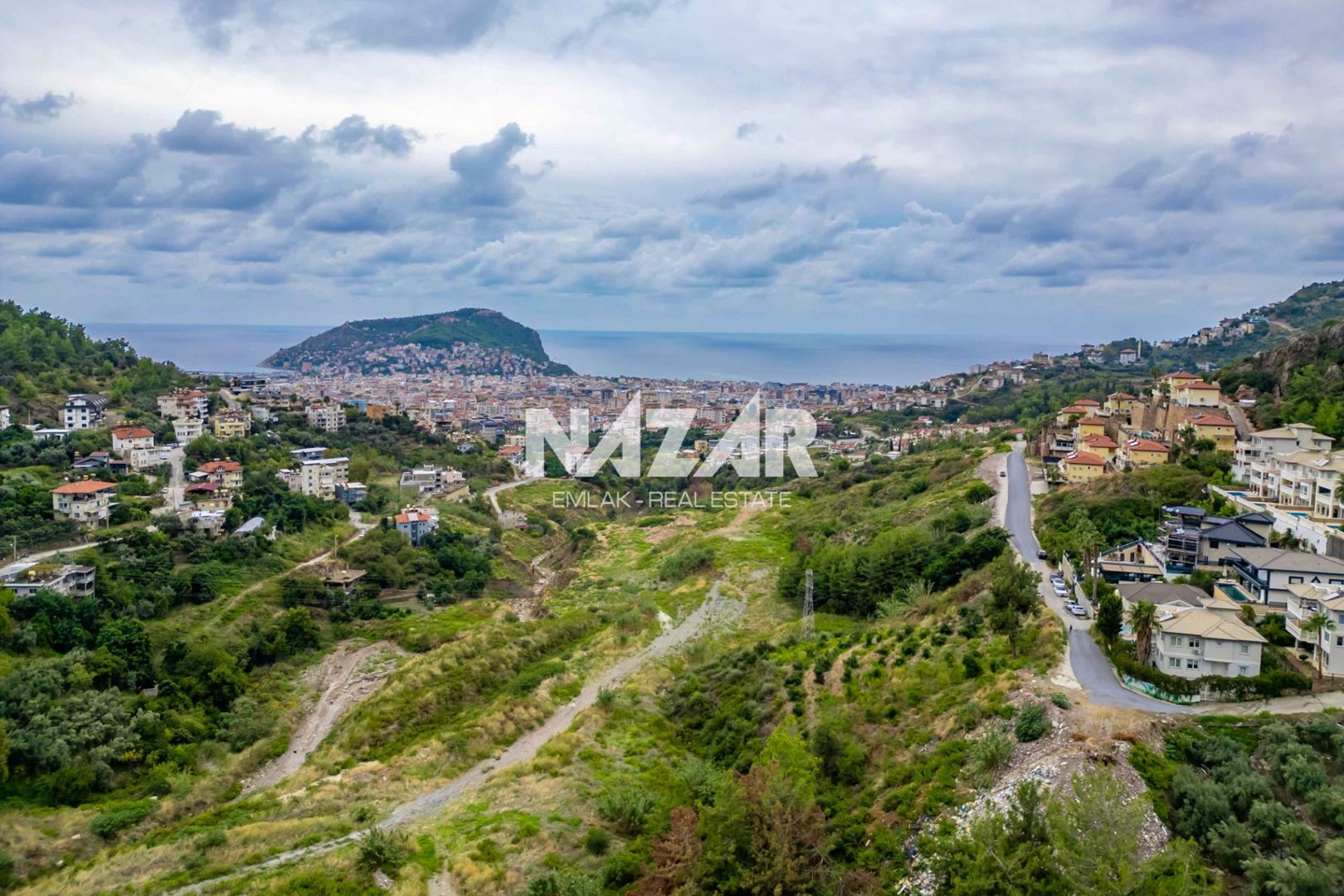 1,000 m² Plot with Sea Views in Alanya Tepe, Zoned for Residential Development · 1