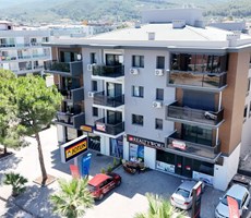 REALTY WORLD EFES'TEN İLKİM İNVEST CADDE KONUTLARINDA SIFIR 1+1