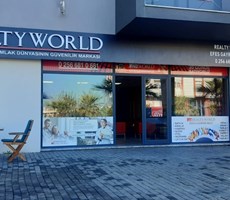 REALTY WORLD EFES'TEN DAVUTLAR'DA 203 DÖNÜM SATILIK TARLA!