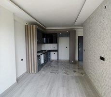 HAN EMLAK'TAN TÖMÜK'TE FIRSAT LÜKS SİTEDE HAVUZLU SATILIK 1+1