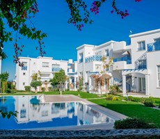 KIBRIS GİRNE ALSANCAK'TA SATILIK 1+1 DAİRE, EŞYALI, SİTE İÇİNDE, ORTAK HAVUZLU VE DENİZE YAKIN