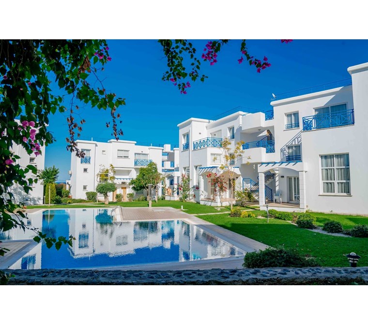 KIBRIS GİRNE ALSANCAK'TA SATILIK 1+1 DAİRE, EŞYALI, SİTE İÇİNDE, ORTAK HAVUZLU VE DENİZE YAKIN