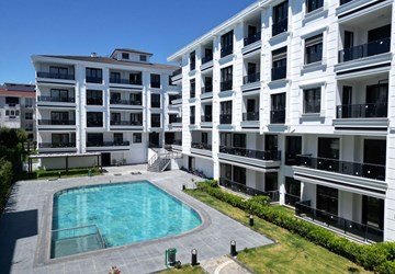 AYVALIK SARIMSAKLIDA SİTE İÇERİSİNDE SATILIK 2+1 LÜKS DAİRE