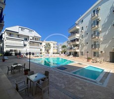 DİDİM ALTINKUM MAHALLESİ DENİZE YAKIN HAVUZLU SİTE İÇİNDE 2+1 EŞYALI DAİRE