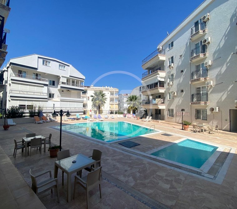 DİDİM ALTINKUM MAHALLESİ DENİZE YAKIN HAVUZLU SİTE İÇİNDE 2+1 EŞYALI DAİRE