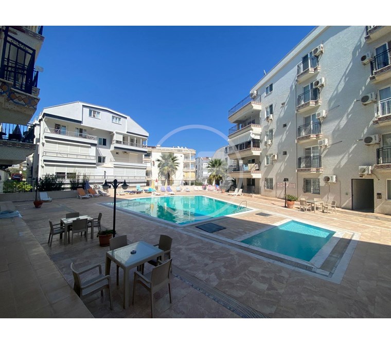 DİDİM ALTINKUM MAHALLESİ DENİZE YAKIN HAVUZLU SİTE İÇİNDE 2+1 EŞYALI DAİRE