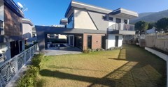 REALTY WORLD EFES GAYRİMENKULDEN GÜZELÇAMLI'DA DOĞA VE DENİZ MANZARALI 4+1 ULTRA LÜKS VİLLA
