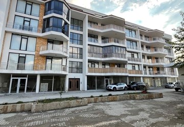 KARŞIYAKA KONUTLARINDA ARA KAT 2+1 127 M2 SATILIK DAİRE
