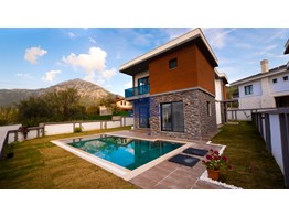 Duplex villa for sale in Fethiye Yeşilüzümlü 5+1 222m² - 500m² land