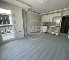 DİDİM EFELER MAHALLESİ'NDE YENİ ASANSÖRLÜ BİNADA ARA KAT ÖN CEPHE 1+1 DAİRE