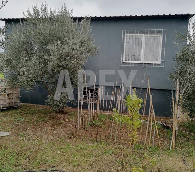 ANTALYA DÖŞEMEALTI KARAVELİLERDE İÇERİSİNDE EV OLAN SATILIK TARLA