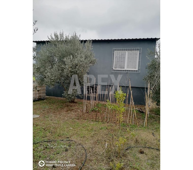 ANTALYA DÖŞEMEALTI KARAVELİLERDE İÇERİSİNDE EV OLAN SATILIK TARLA