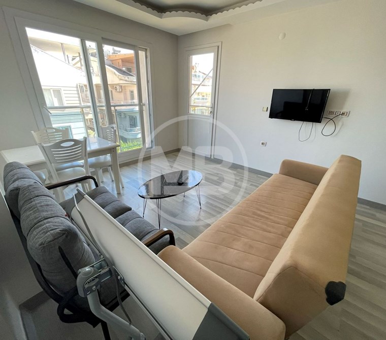DİDİM' DE MERKEZİ KONUMDA BÜYÜK BALKONLU ÖN CEPHE 1+1 DAİRE