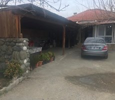 köyceğiz döğüşbelende satılık 1000 m2 bahçe içerisinde müstakil ev
