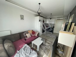 SOYLU'DAN ÇİFTLİKKÖY'DE DENİZ MANZARALI EŞYALI 1+1 KİRALIK
