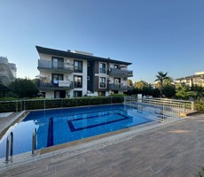 KUŞADASI DAVUTLARDA SATILIK 2+1 BAHÇE KATI DAIRE