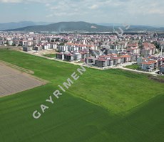 GAYRİMENKULPLUS / TORBALI MERKEZDE 74.105 m² İMARLI ARAZİ