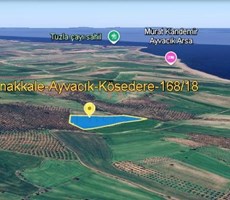ÇANAKKALE AYVACIK KÖSEDERE KÖYÜNDE DENİZ MANZARALI SATILIK TARLA