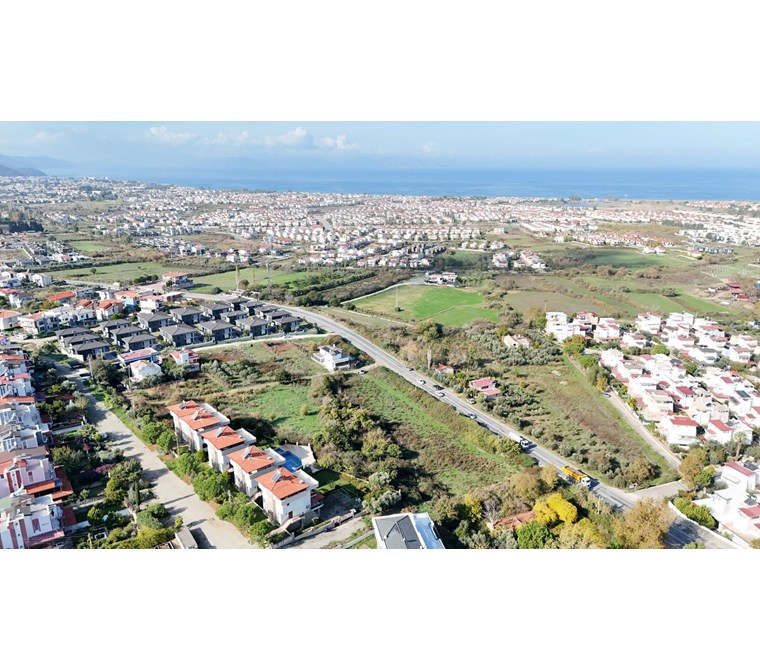 REALTY WORLD EFES'TEN 14 VILLALIK GUZELCAMLIDA KUPON KÖŞE ARSA