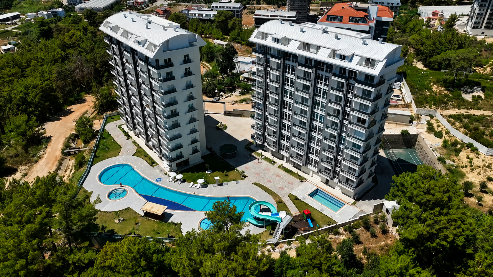 ALANYA AVSALLARDA HAVUZ MANZARALI LÜKS KOMPLEKSTE 1+1 SATILIK DAİRE · 2 · Fotoğraflar