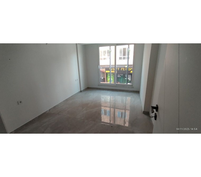 Ortaca merkezde ticari kullanım izni olan satılık 1+1 daire